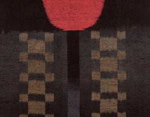 Handwoven silk ikat in black and gold checks with red center