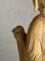 Load image into Gallery viewer, Light colored handcarved wood statue of Jizo as a man, holding a staff with 6 gold rings and in his other hand the Wish Fulfilling Gem, back view close up showing markes for the carver
