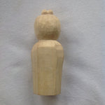 Load image into Gallery viewer, Back view, simple detail, only marks of the tools ,5 inch tall light colored wood hand carved statue of a Japanese Kuan Yin, knows as Kannon, holding a lotus.
