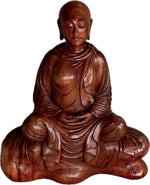 Load image into Gallery viewer, Wooden sculpture of wooden Buddhist nun seated in meditation front view white background
