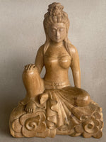 Load image into Gallery viewer, Wooden sculpture of a seated Quan Yin with intricate carvings on a neutral background
