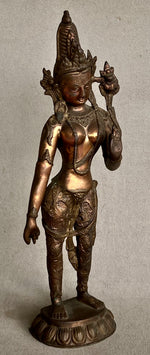 Load image into Gallery viewer, Bronze statue of Standing Tara with intricate details on a gray background 3/4 view
