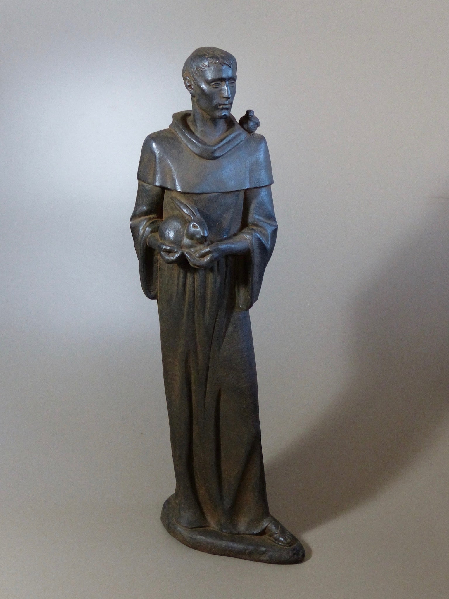 Saint Francis of Assisi Statue Antique Rust 32 inches holding a baby rabbit with a bird on his shoulder