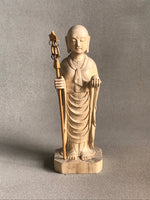 Load image into Gallery viewer, Light colored wood carving of a Jizo woman staute holding a staff and the wishfulfilling gem 
