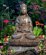 Load image into Gallery viewer, Quan Yin statue seated on double lotus in a garden of flowers.A small Buddha in her headdress and a serene feeling. Antique rust color 24 inches
